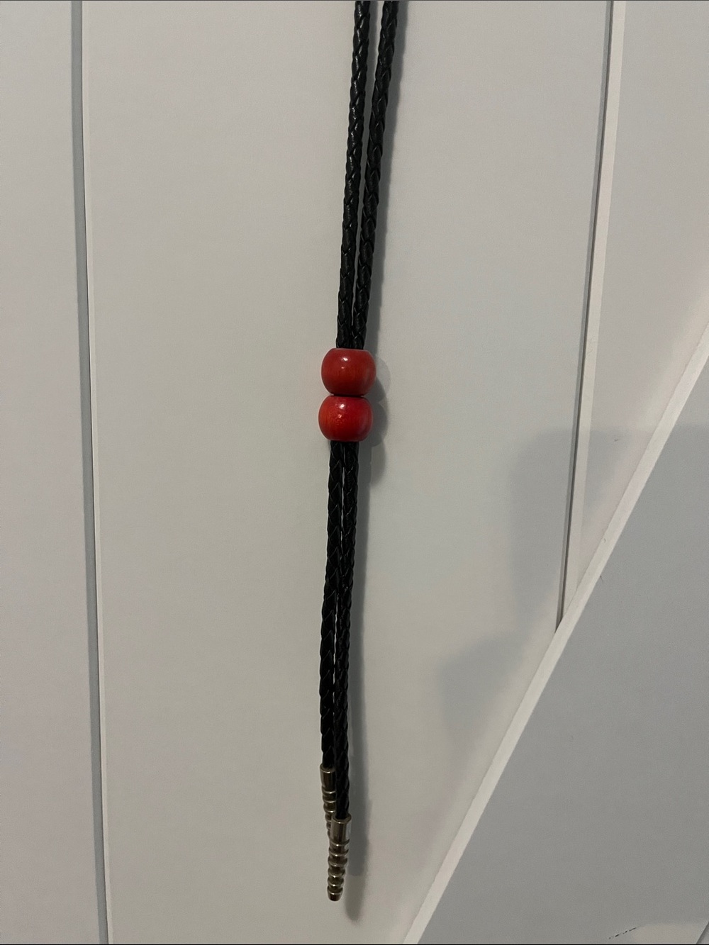 Black Braided Leather Bolo Tie with Red Beads